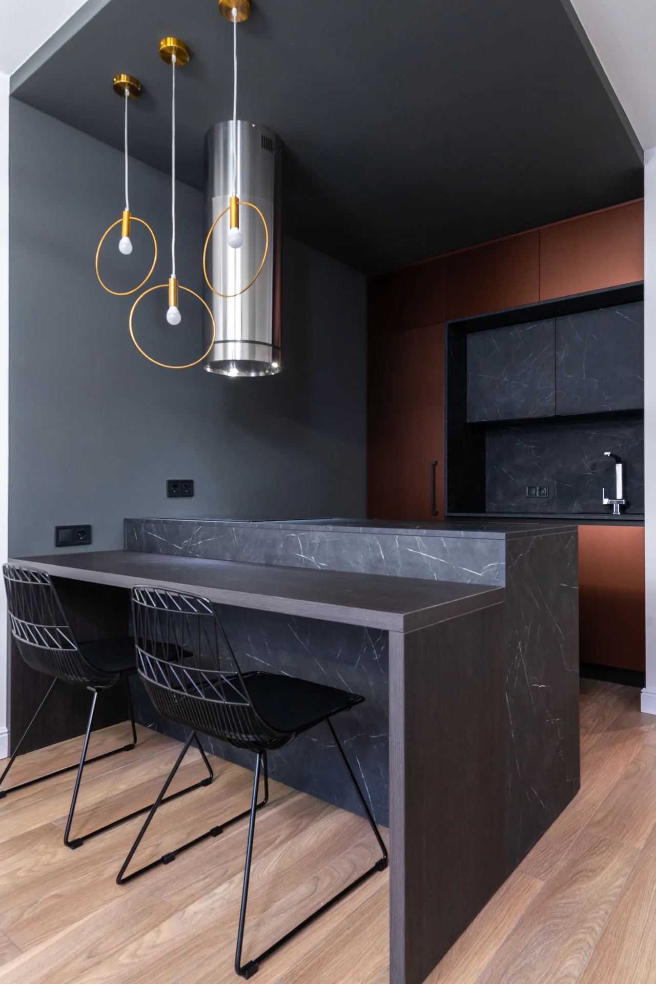 Modern domestic kitchen with pendant lighting